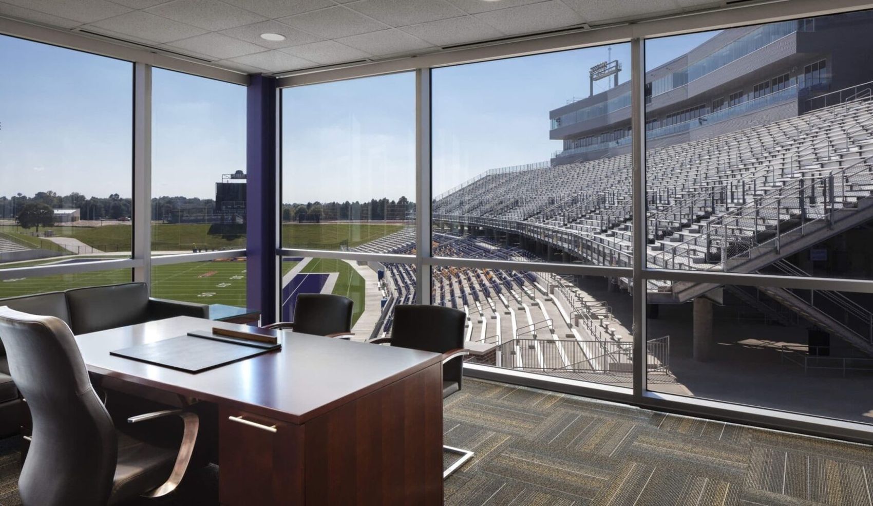 An empty athletics office overlooking an empty stadium