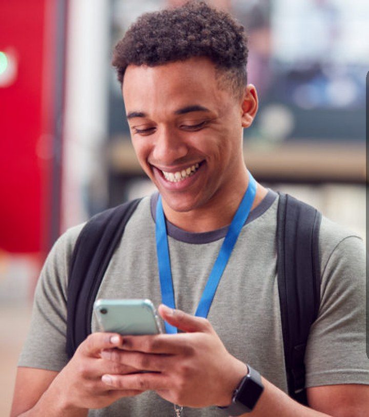 A student-athlete on his phone