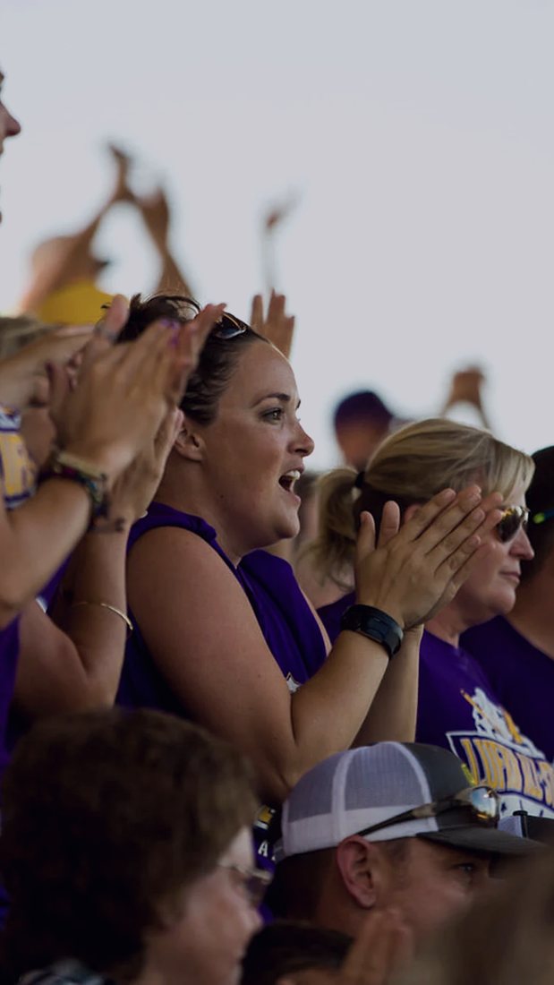 Real fans cheering in the stands