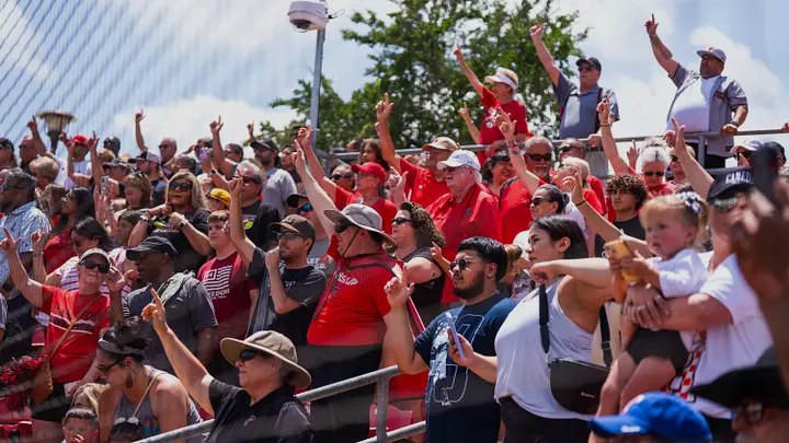 A declared fan base on its feet in team colors